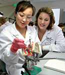 SRJC Dental students practice cleaning teeth